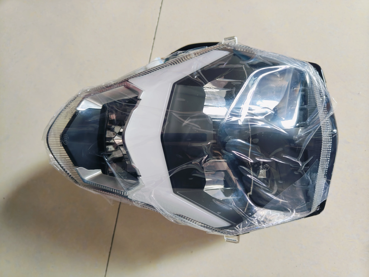 Headlight suit CF250NK code is 6KMV-160100-B102